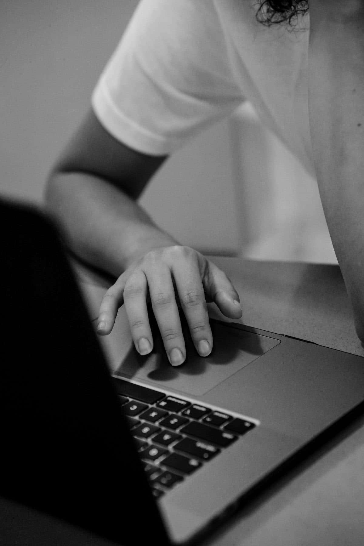 Reviewing campaign performance on a laptop trackpad